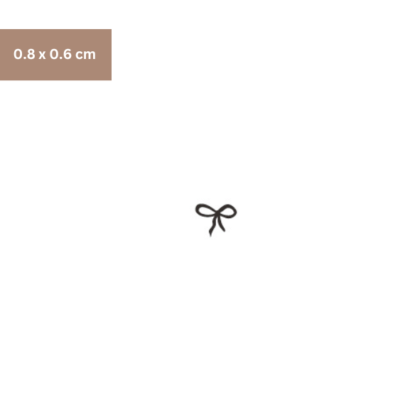 Hailey Bieber Bow Schleife Tattoo