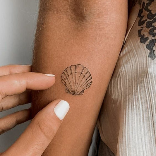 Muschel Tattoo
