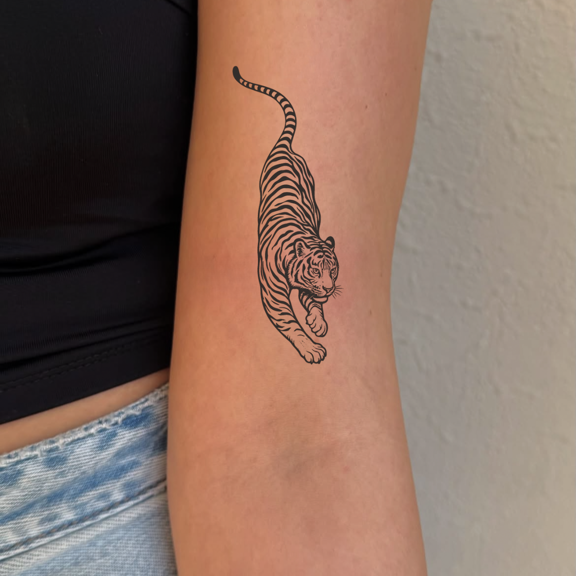 Gepard Löwe Tattoo